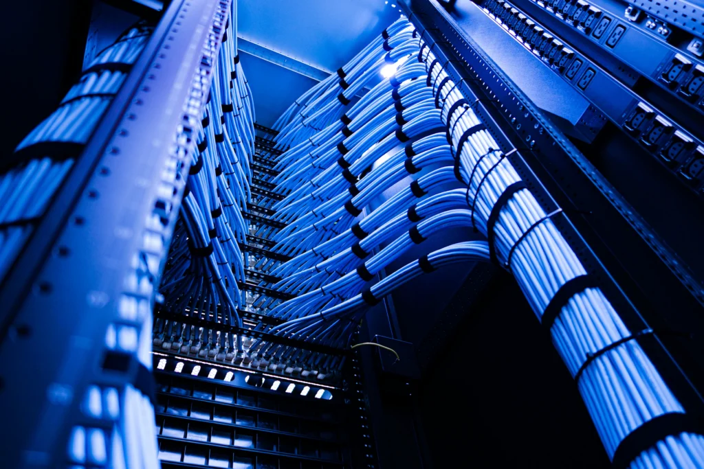 Data center cables inside rack, low angle view looking up